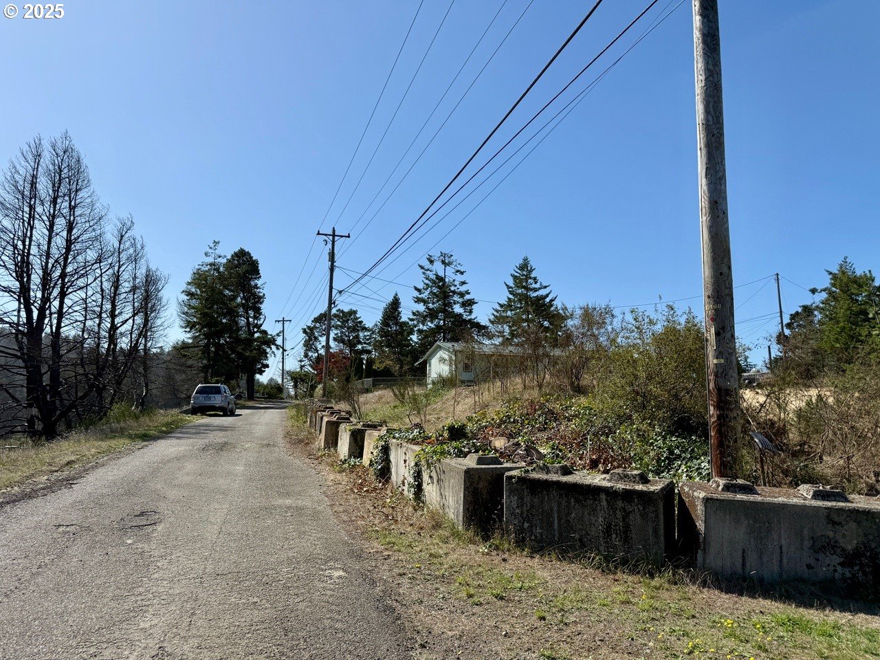 68760 Hauser Road North Bend, OR 97459 - Photo 6 of 6 a view of a terrace with a garden