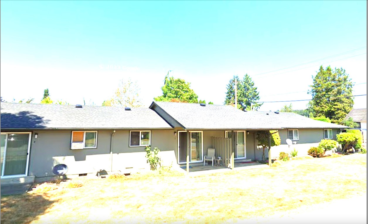 601 West Elizabeth Street Monroe, WA 98272 - Photo 7 of 7 a front view of a house with a yard and porch