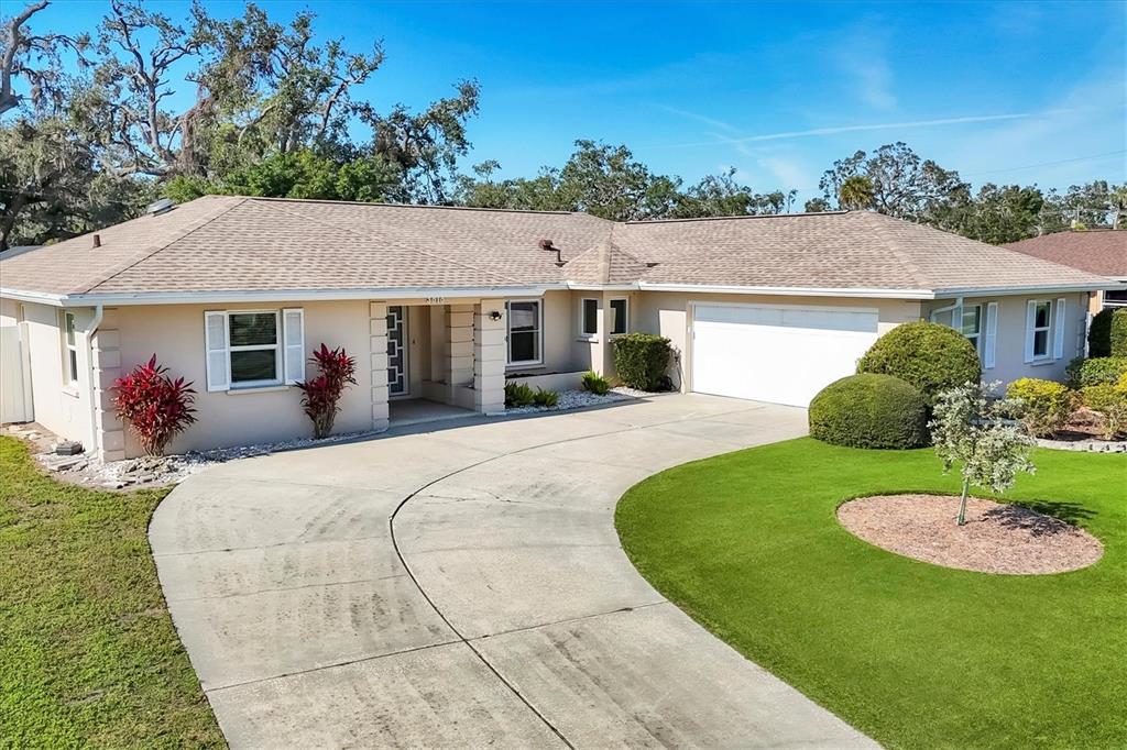 Restricted Address Sarasota, FL 34231 - Photo 1 of 1 front view of a house with a yard