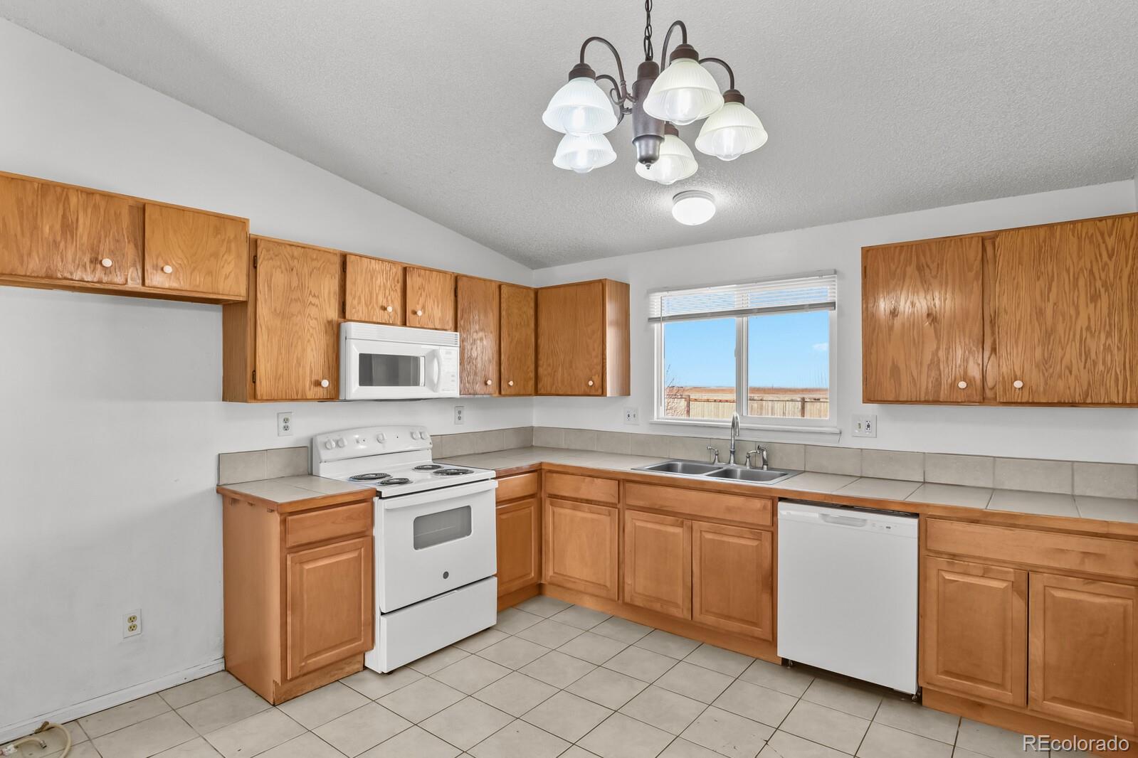 845 Madison Way Bennett, CO 80102 - Photo 7 of 24