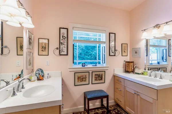 a bathroom with a shower and a sink