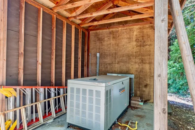 a view of a chairs and table in backyard