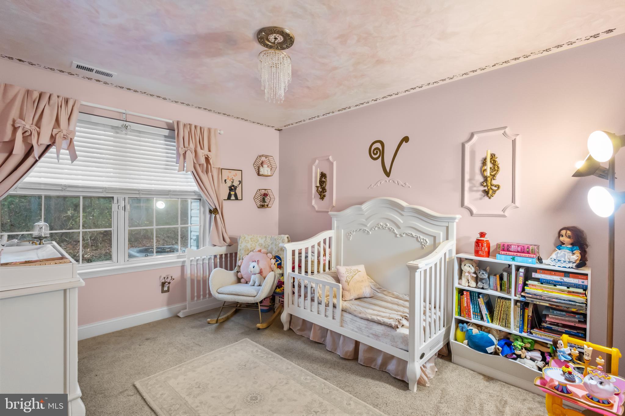 705 Quail Road Marlton, NJ 08053 - Photo 10 of 13 a bedroom with furniture a baby crib and a window