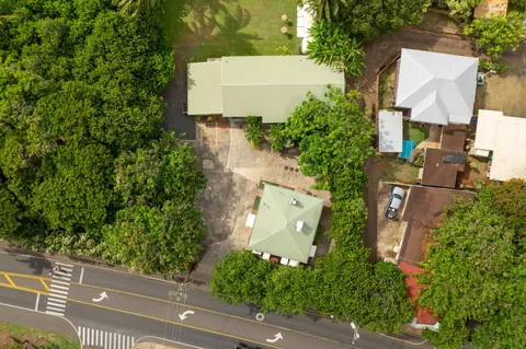 an aerial view of a house with outdoor space