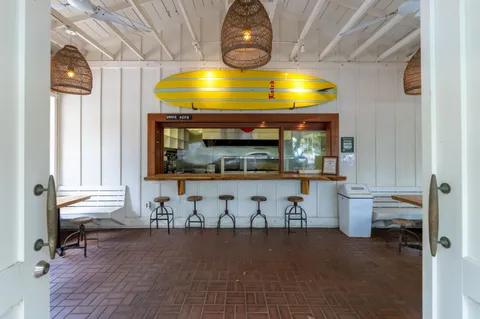 a room with fireplace and painted walls