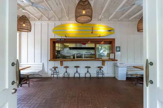 a room with fireplace and painted walls