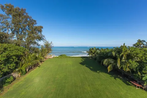 a view of a lake with a big yard
