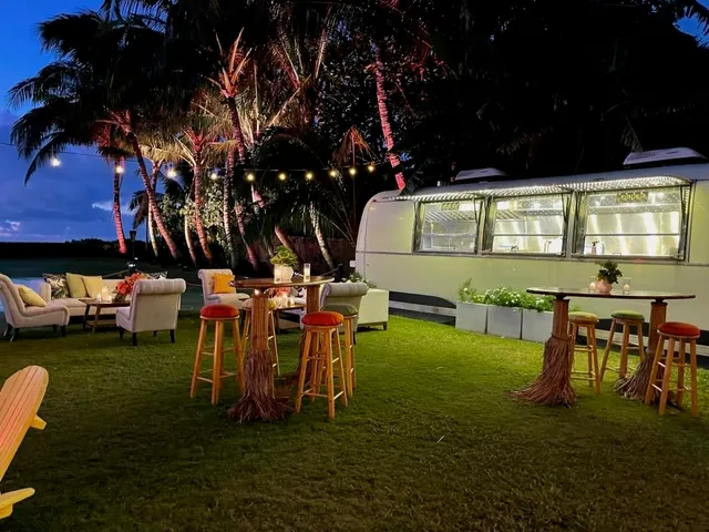a view of a chairs and tables in the patio of a house