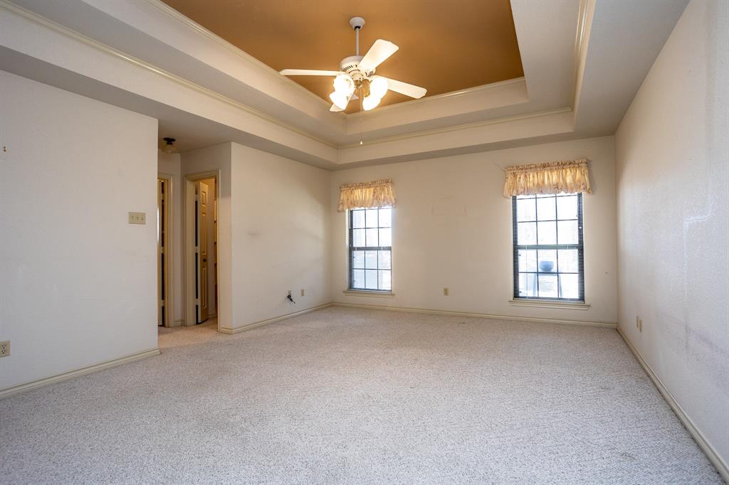 714 Mill Creek Road Lancaster, TX 75146 - Photo 12 of 27 Spacious master suite has special Ceiling design with 2 walk in closets as you entry the master bath.