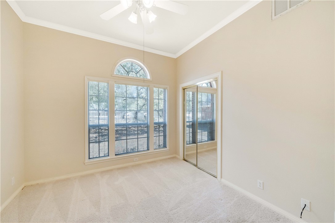 11901 Jess Drive Austin, TX 78737 - Photo 20 of 36 an empty room with windows and front door