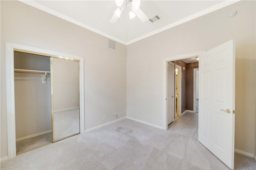 11901 Jess Drive Austin, TX 78737 - Photo 21 of 36 a view of an empty room with closet and a window