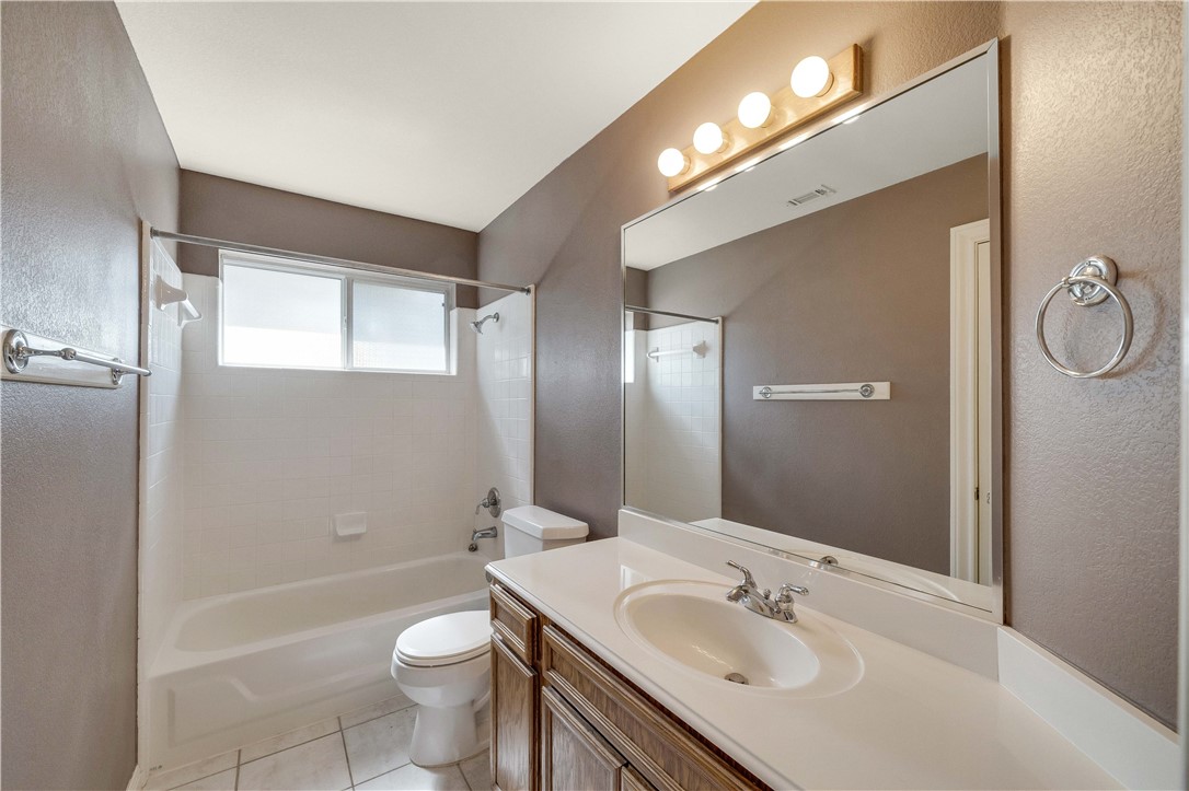 11901 Jess Drive Austin, TX 78737 - Photo 26 of 36 a bathroom with a sink a toilet and shower