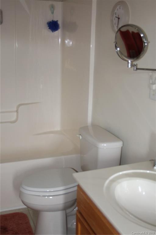 7539 Bluff Point Lane Denver, NC 28037 - Photo 22 of 30 a bathroom with a toilet and a sink