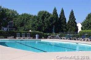7539 Bluff Point Lane Denver, NC 28037 - Photo 30 of 30 a view of swimming pool with outdoor seating and trees in the background