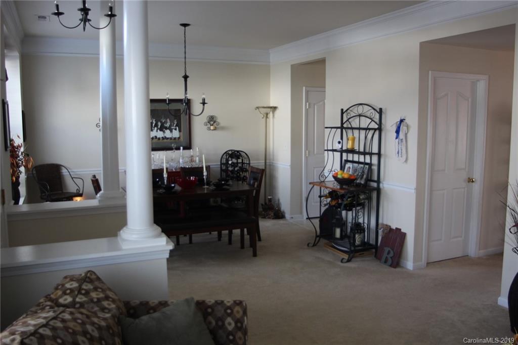 7539 Bluff Point Lane Denver, NC 28037 - Photo 6 of 30 a living room with furniture and a window
