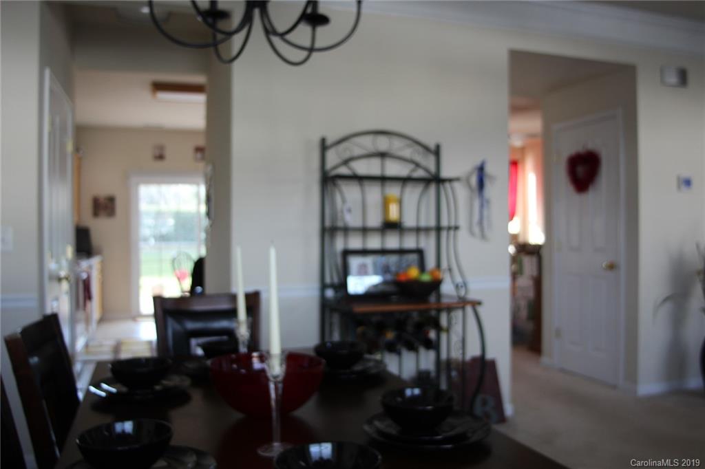 7539 Bluff Point Lane Denver, NC 28037 - Photo 8 of 30 a view of a livingroom with furniture and window