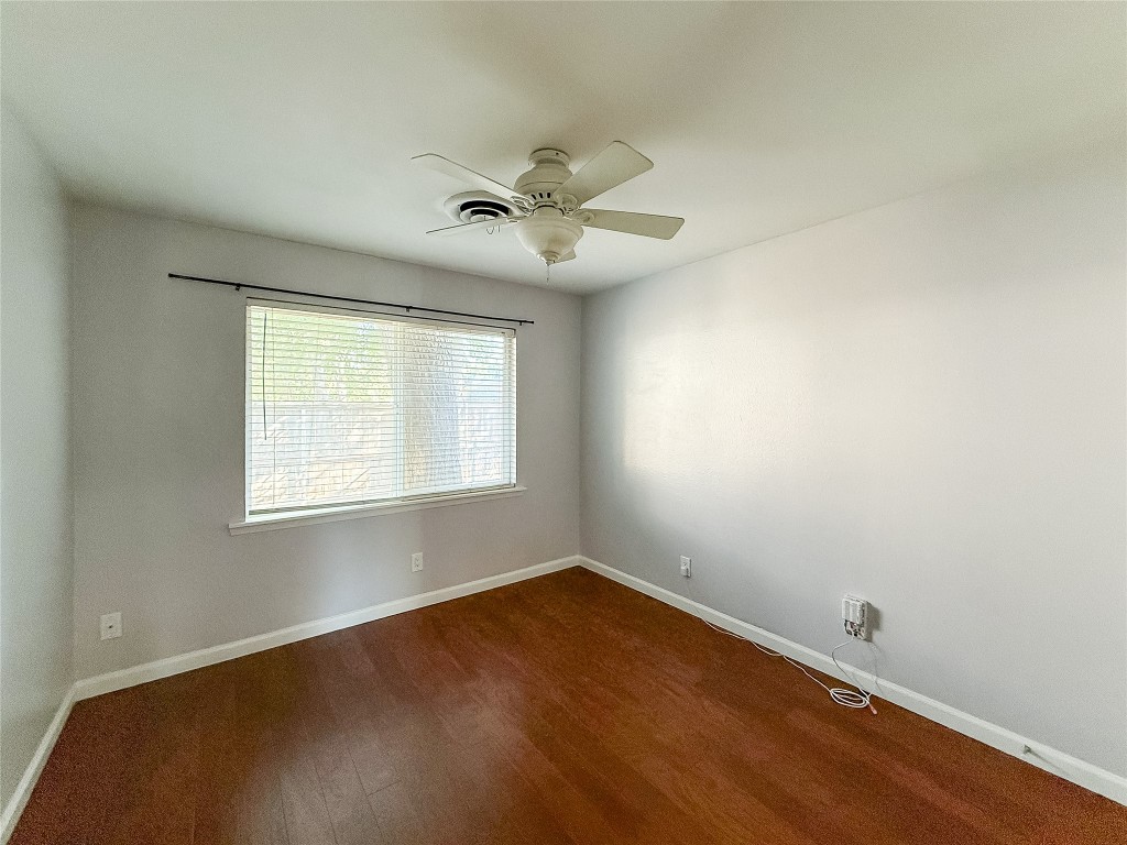 2309 Alta Vista Avenue, Unit B Austin, TX 78704 - Photo 11 of 19 wooden floor in an empty room with a window
