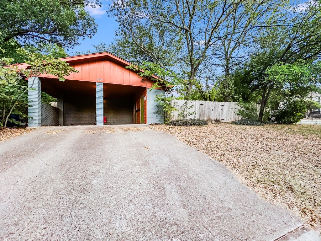 2309 Alta Vista Avenue, Unit B Austin, TX 78704 - Photo 2 of 19 a view of a house with a yard and a large tree