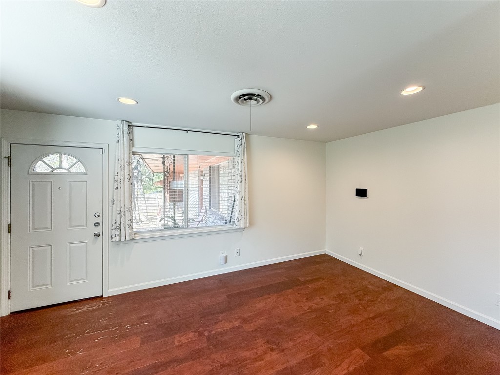 2309 Alta Vista Avenue, Unit B Austin, TX 78704 - Photo 5 of 19 a view of an empty room with wooden floor and a window