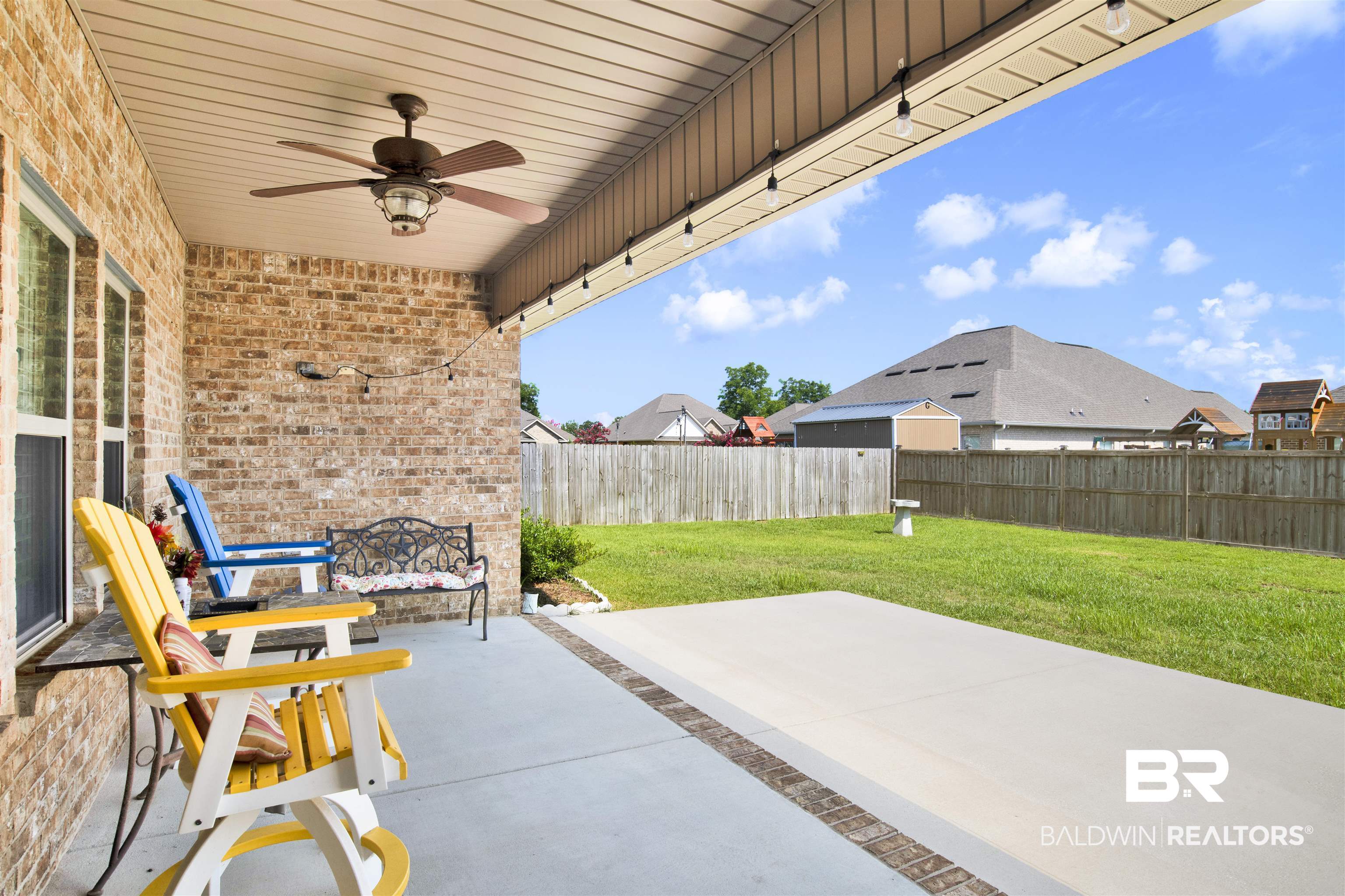278 Silo Loop Fairhope, AL 36532 - Photo 20 of 26 Fenced backyard featuring a patio area and a ceiling fan