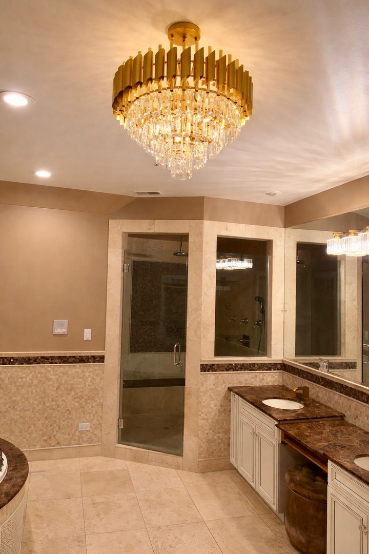 7381 South Madison Street Burr Ridge, IL 60527 - Photo 18 of 30 a bathroom with a granite countertop sink and a mirror