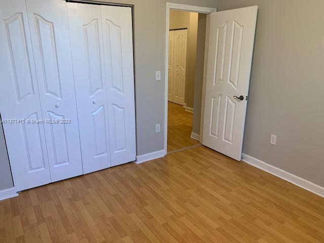 Silver Palm Homes Miami, FL 33170 - Photo 17 of 32 a view of an empty room with wooden floor