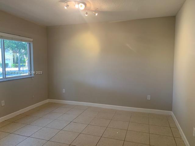 Silver Palm Homes Miami, FL 33170 - Photo 2 of 32 an empty room with a window