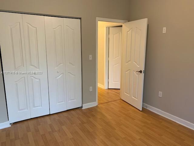 Silver Palm Homes Miami, FL 33170 - Photo 24 of 32 a view of an empty room with wooden floor