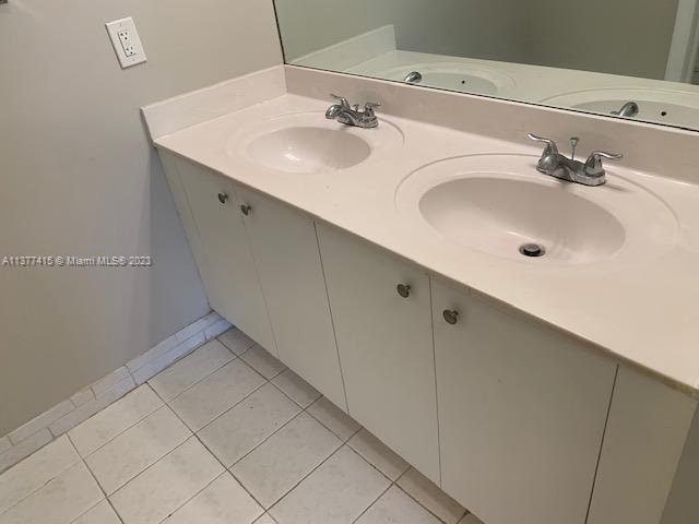 Silver Palm Homes Miami, FL 33170 - Photo 27 of 32 a bathroom with a sink and a mirror