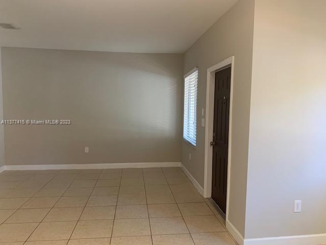 Silver Palm Homes Miami, FL 33170 - Photo 4 of 32 a view of an empty room with a window
