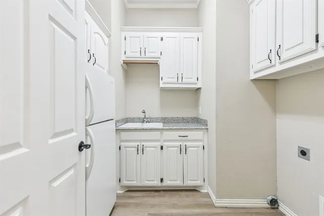 a view of cabinets and sink