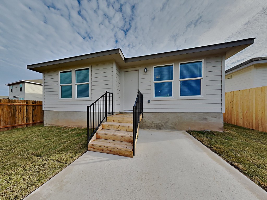 5236 Gallop Lane Georgetown, TX 78626 - Photo 13 of 13 a front view of a house with a yard