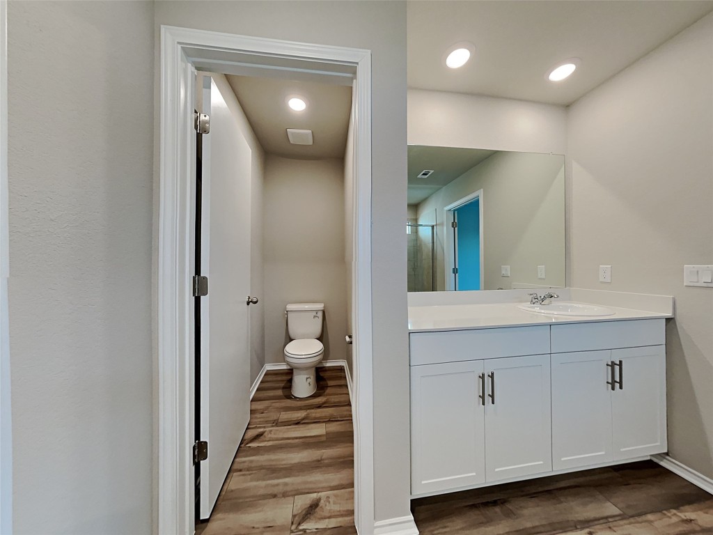 5236 Gallop Lane Georgetown, TX 78626 - Photo 7 of 13 a bathroom with a sink and a mirror
