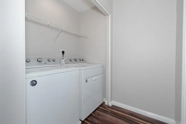 a utility room with dryer and washer