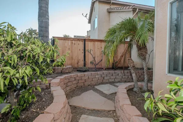 a view of balcony with a potted plant