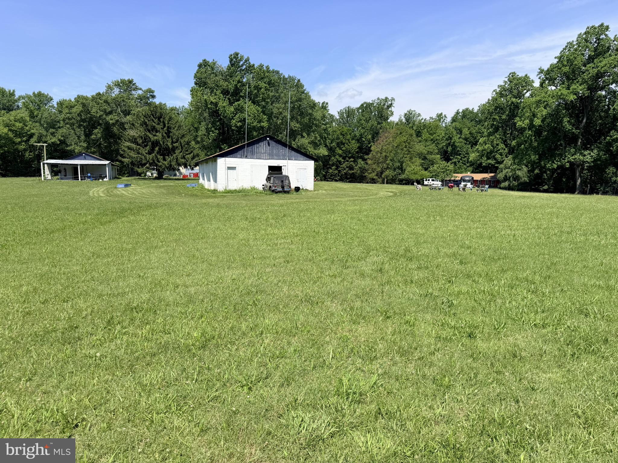 586 Zeitler Road Elkton, MD 21921 - Photo 39 of 55 Spacious green landscape with a barn.