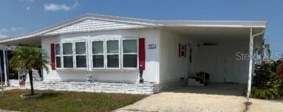 a kitchen with stainless steel appliances a refrigerator sink and stove