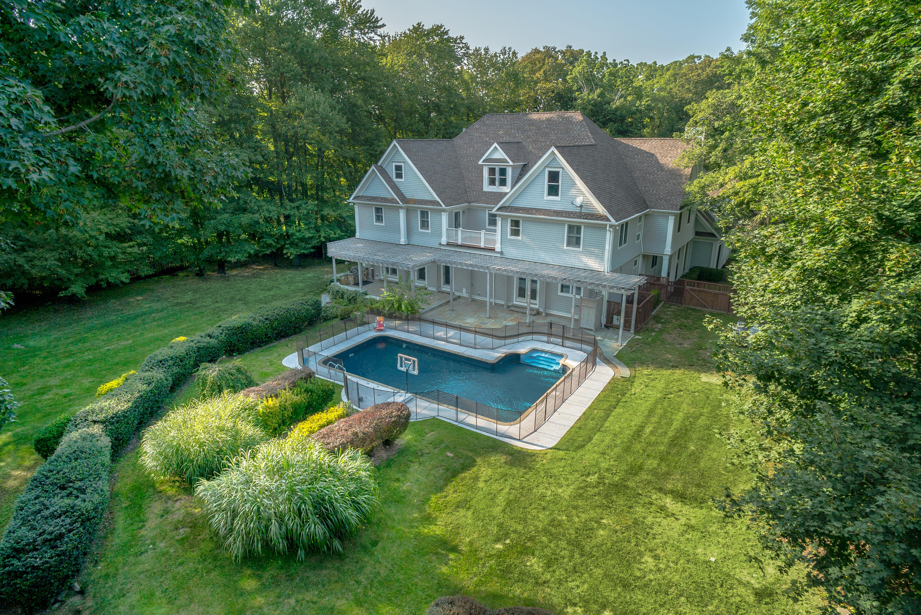 536 Roxbury Road Stamford, CT 06902 - Photo 2 of 38 a aerial view of a house with a big yard