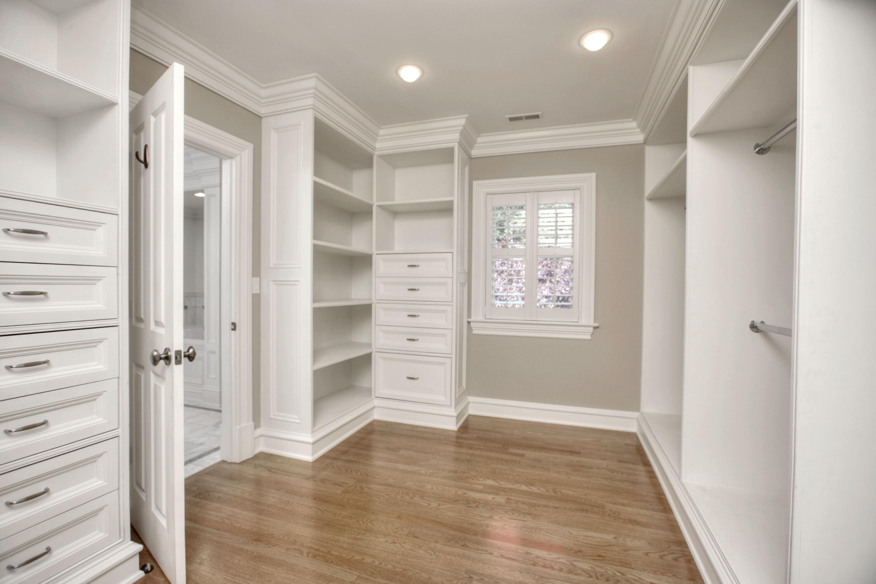 536 Roxbury Road Stamford, CT 06902 - Photo 14 of 38 a view of a hallway with wooden floor and closet area