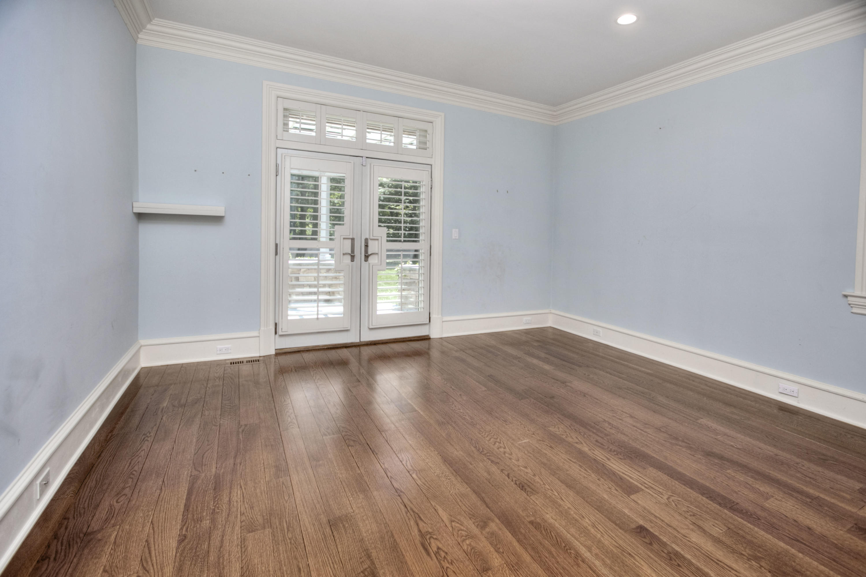 536 Roxbury Road Stamford, CT 06902 - Photo 17 of 38 a view of an empty room with wooden floor and a window