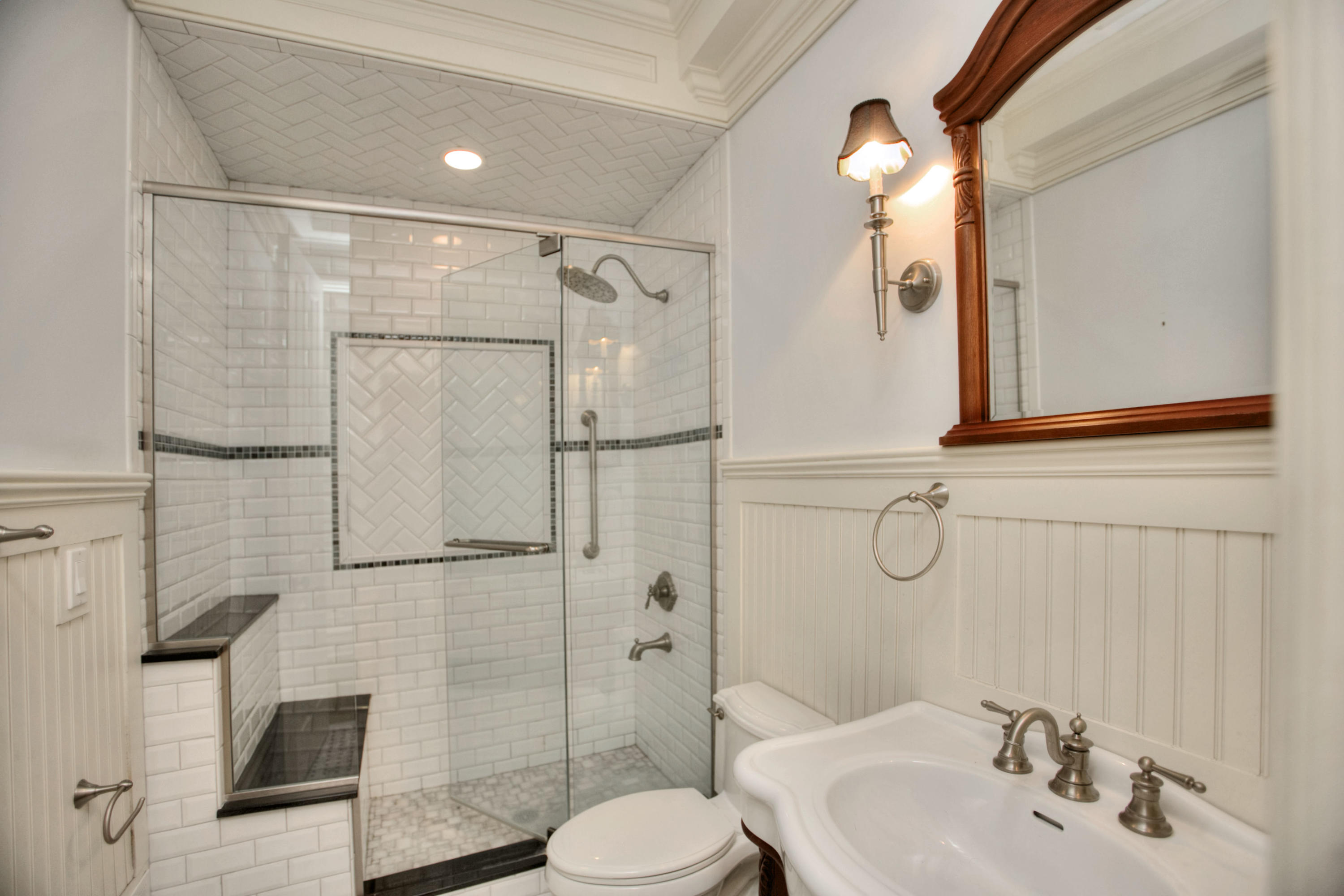 536 Roxbury Road Stamford, CT 06902 - Photo 18 of 38 a bathroom with a sink toilet and shower