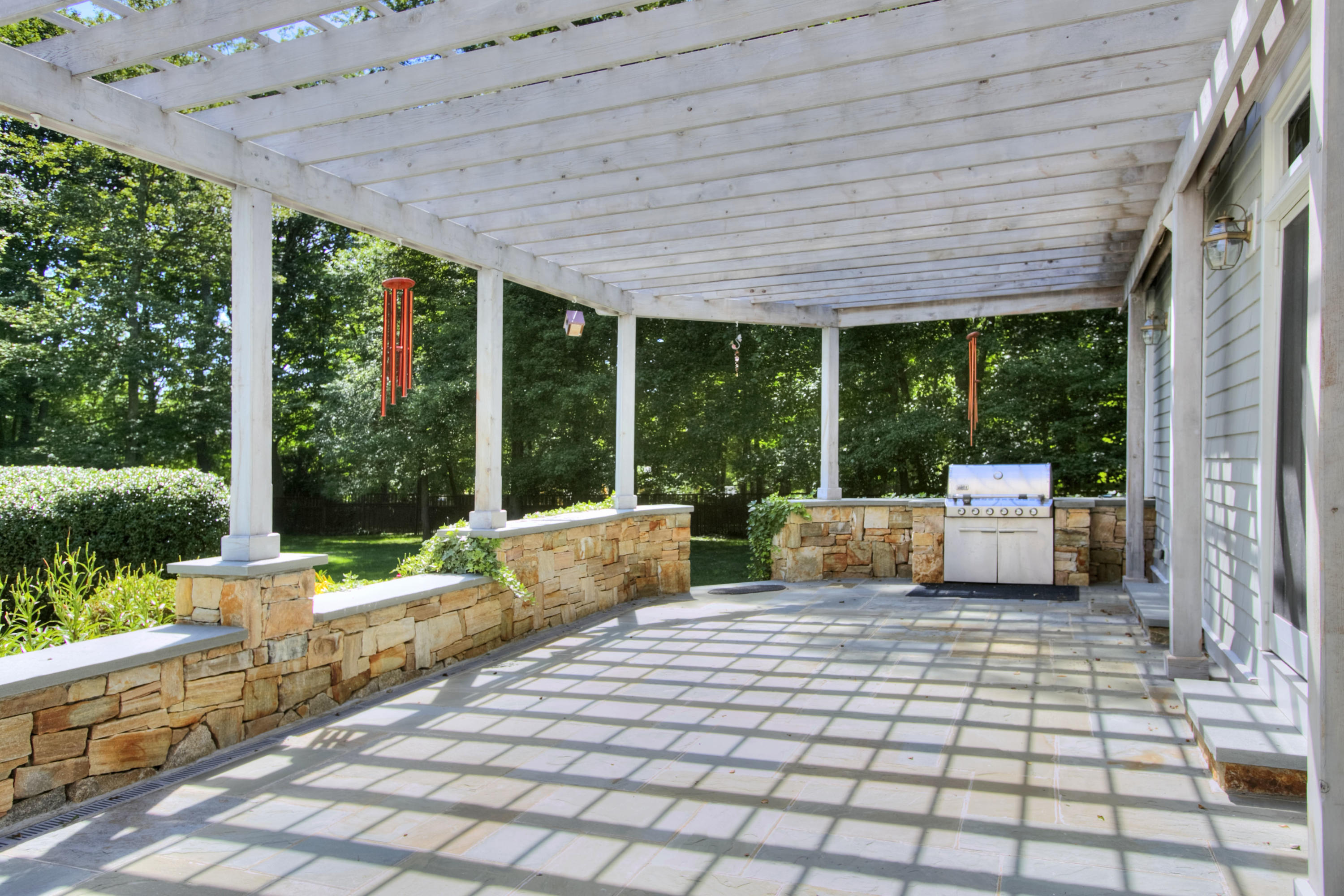 536 Roxbury Road Stamford, CT 06902 - Photo 3 of 38 a view of a patio with a chairs in patio