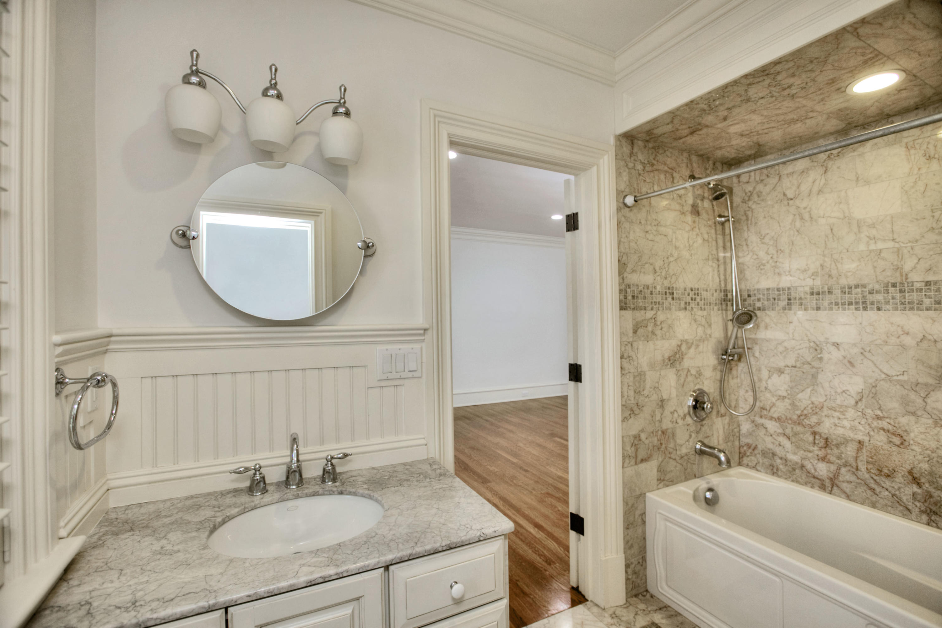 536 Roxbury Road Stamford, CT 06902 - Photo 22 of 38 a bathroom with a sink a toilet and shower