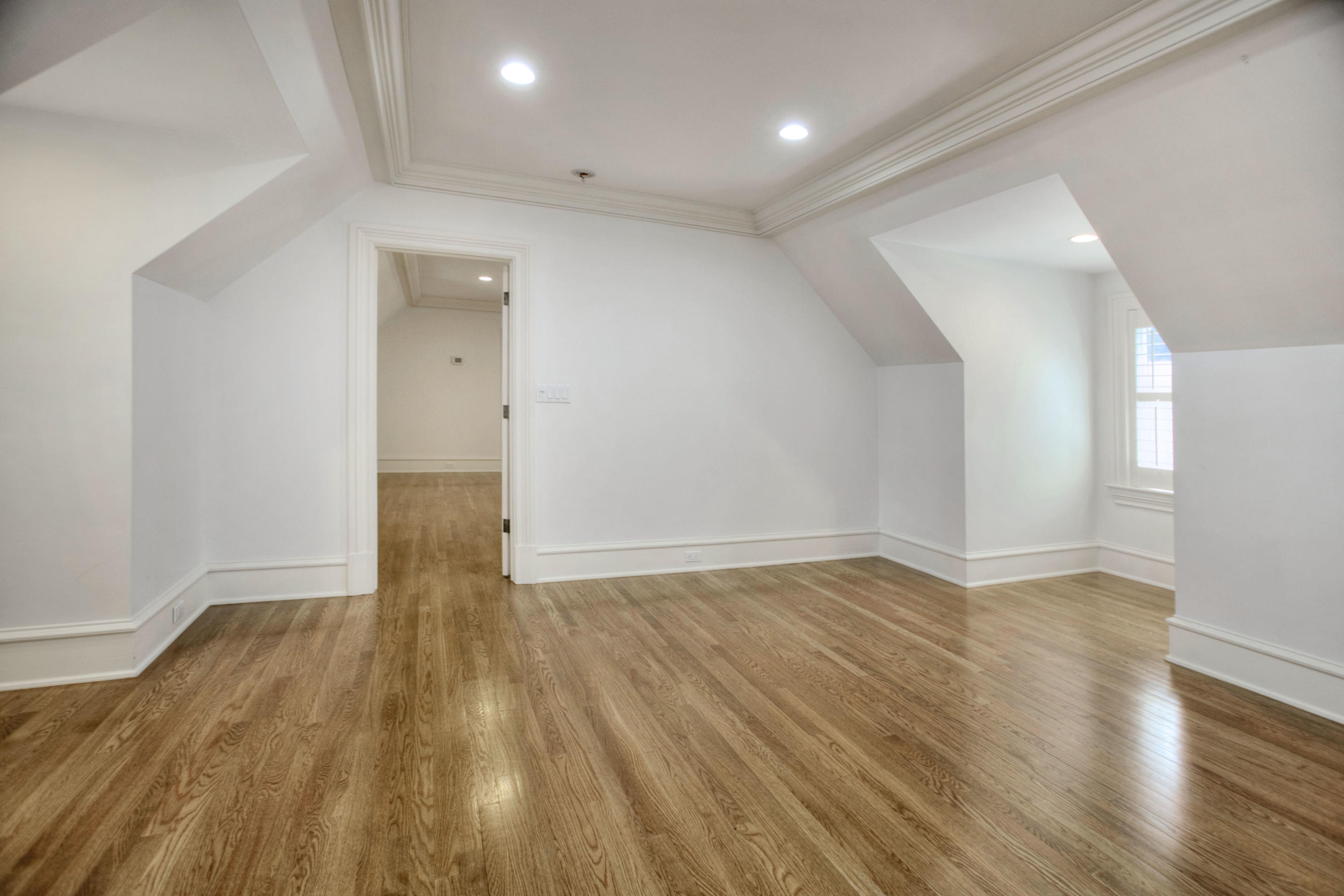 536 Roxbury Road Stamford, CT 06902 - Photo 23 of 38 a view of an empty room and wooden floor