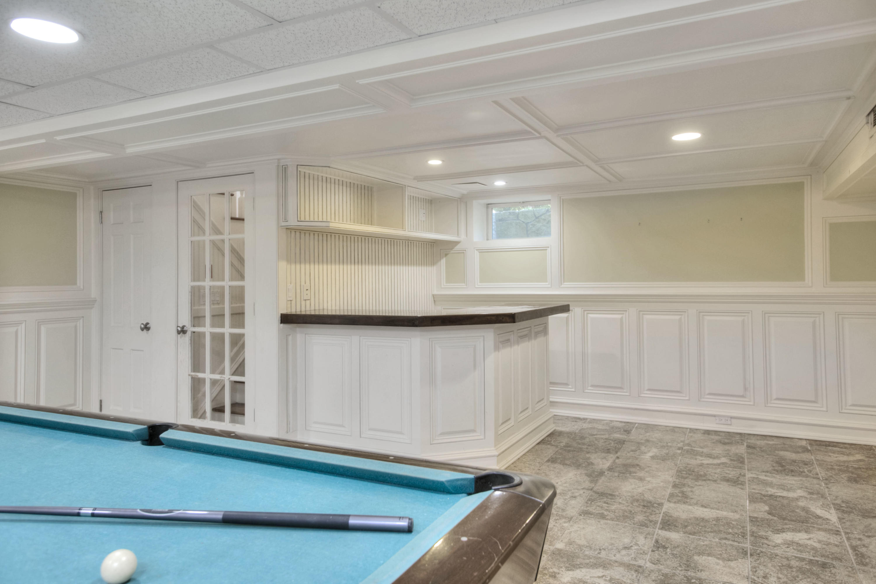 536 Roxbury Road Stamford, CT 06902 - Photo 26 of 38 a view of a livingroom with an empty space and wooden floor