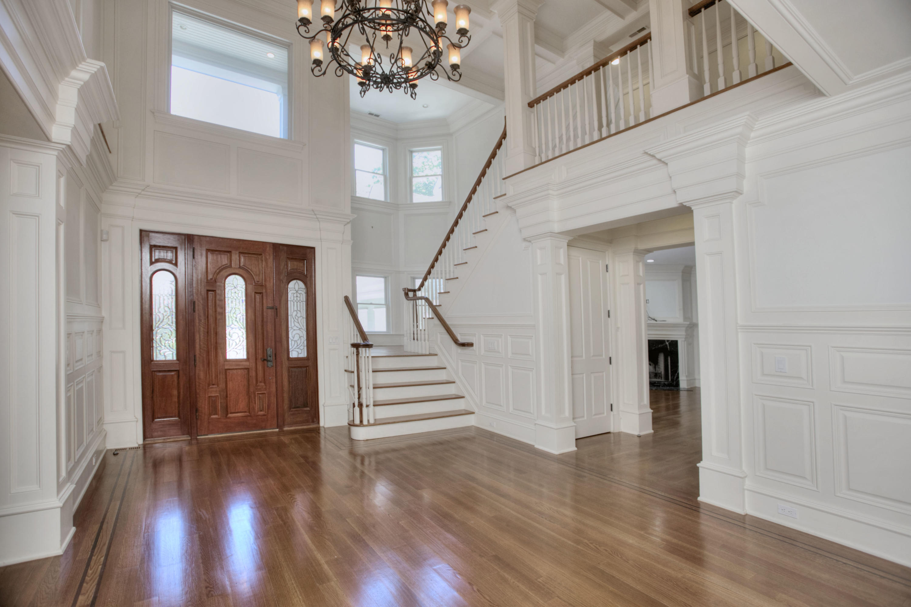 536 Roxbury Road Stamford, CT 06902 - Photo 4 of 38 a view of entryway with stairs and wooden floor