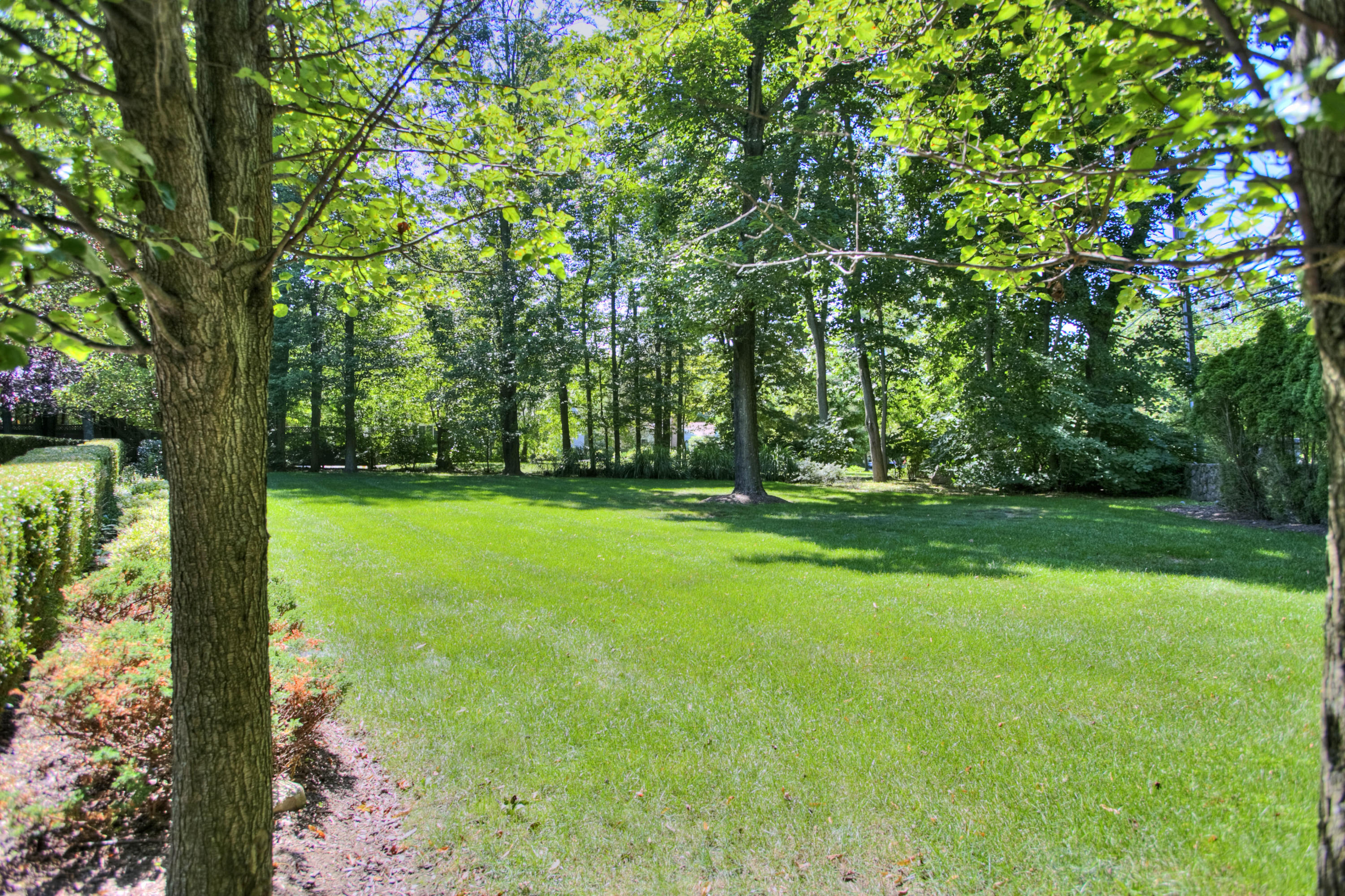 536 Roxbury Road Stamford, CT 06902 - Photo 31 of 38 a view of green field with trees in the background