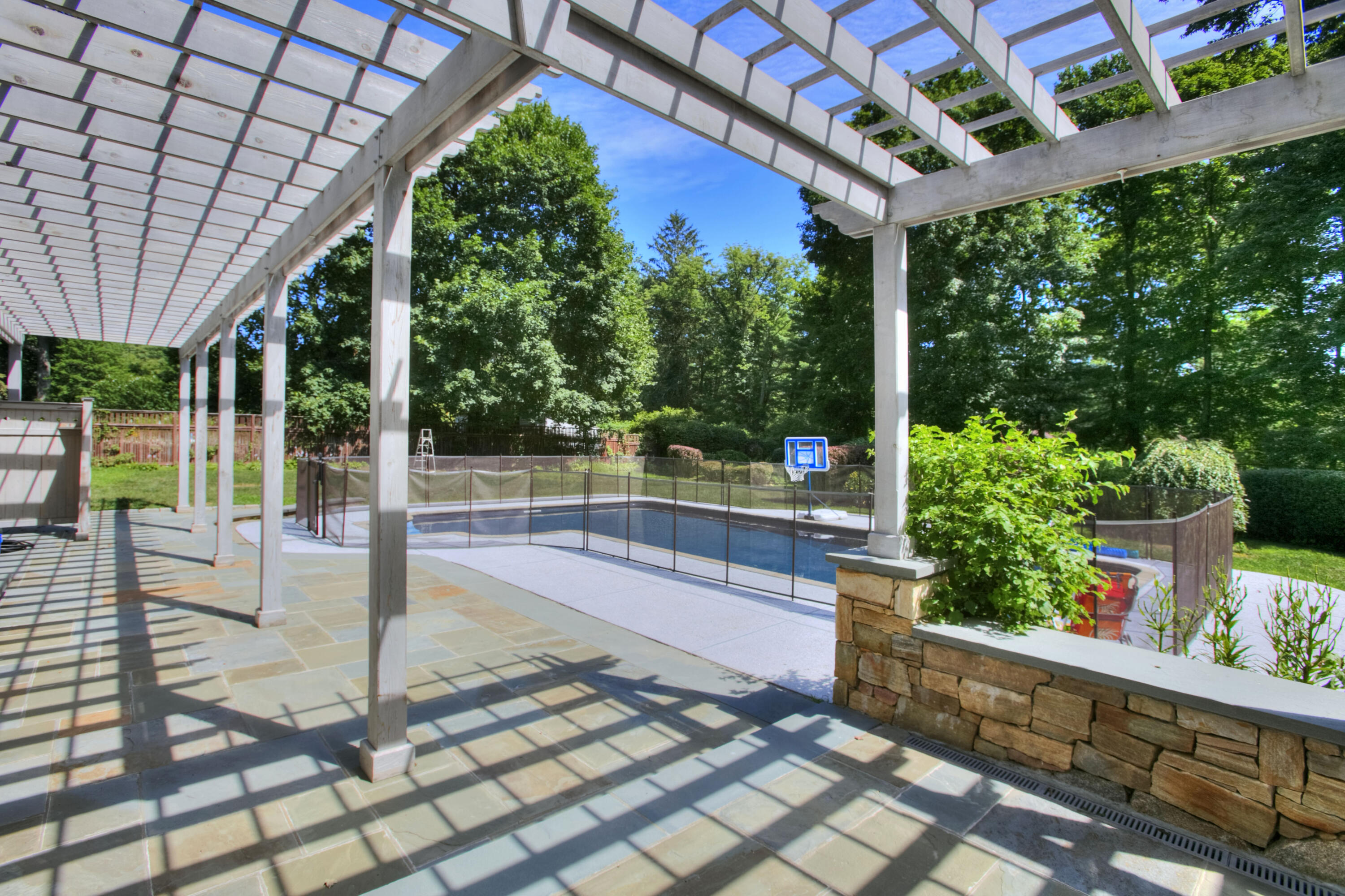 536 Roxbury Road Stamford, CT 06902 - Photo 33 of 38 a building outdoor space with patio furniture and potted plants