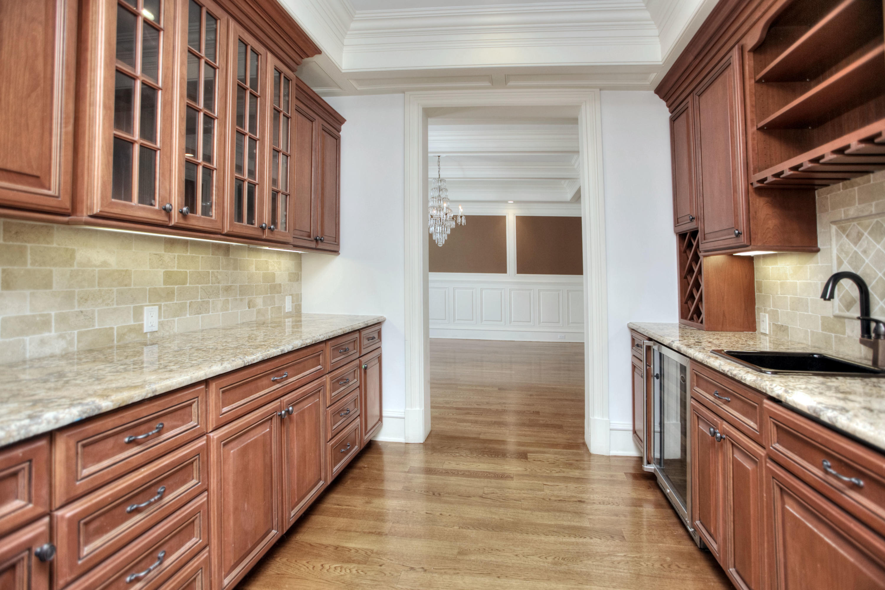 536 Roxbury Road Stamford, CT 06902 - Photo 8 of 38 a kitchen with stainless steel appliances granite countertop a sink and cabinets