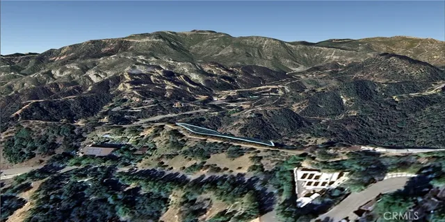 a view of a house in a field